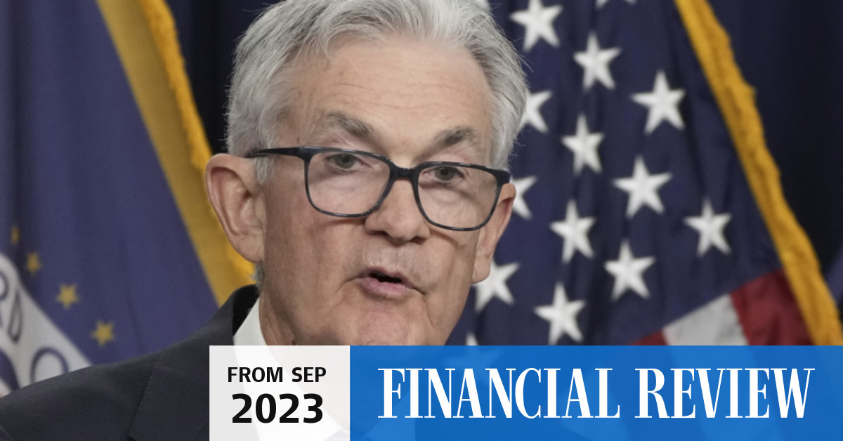 Federal Reserve holds interest rates, sees tighter policy through 2024